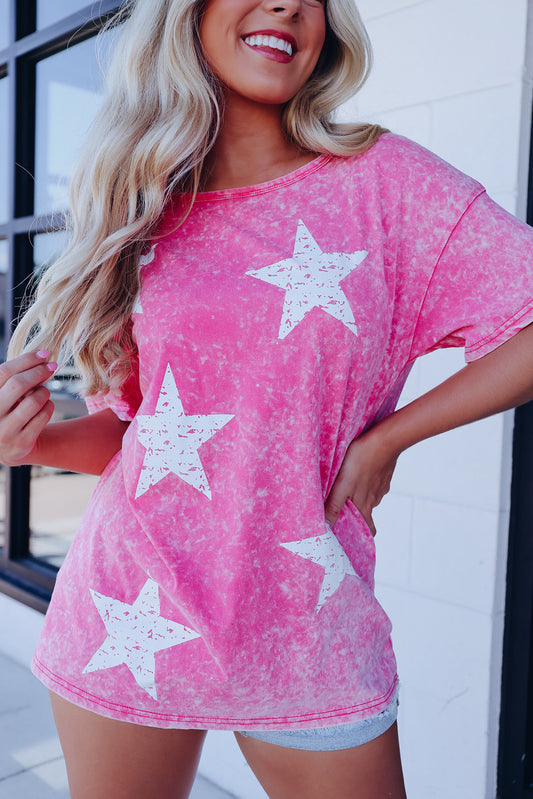 Camiseta rosa con lavado mineral y estampado de estrellas vintage