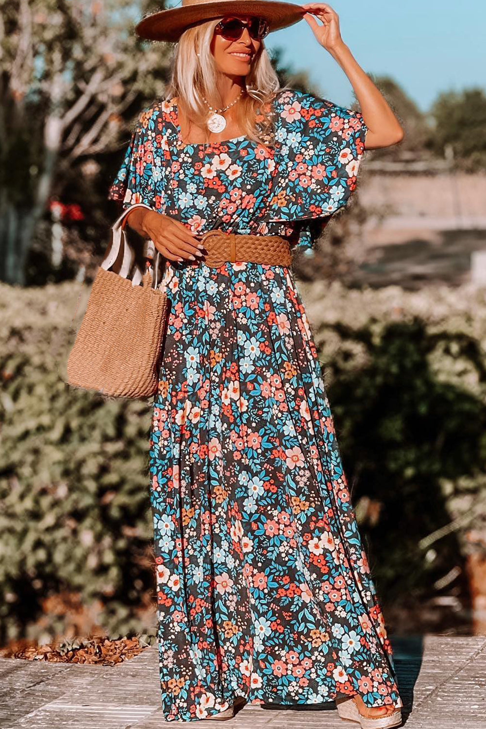 Vestido largo sin espalda anudado con estampado floral boho azul cielo