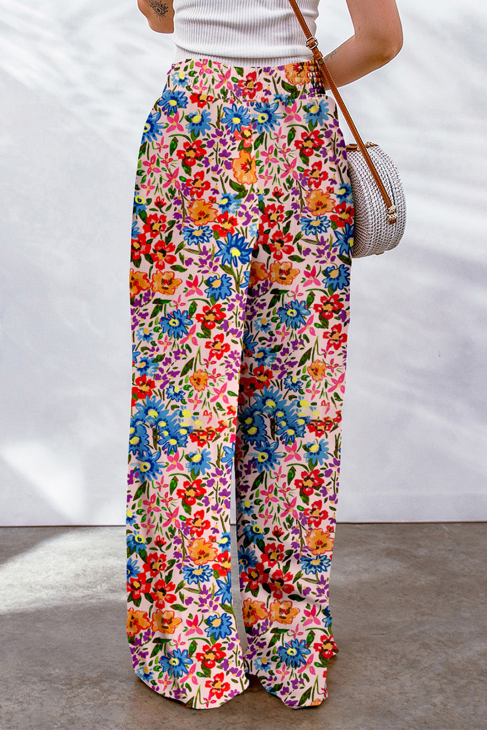 Pantalones extragrandes de pernera ancha con bolsillos y estampado floral multicolor