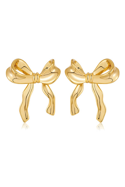 Aretes con forma de lazo y cinta elegante de oro