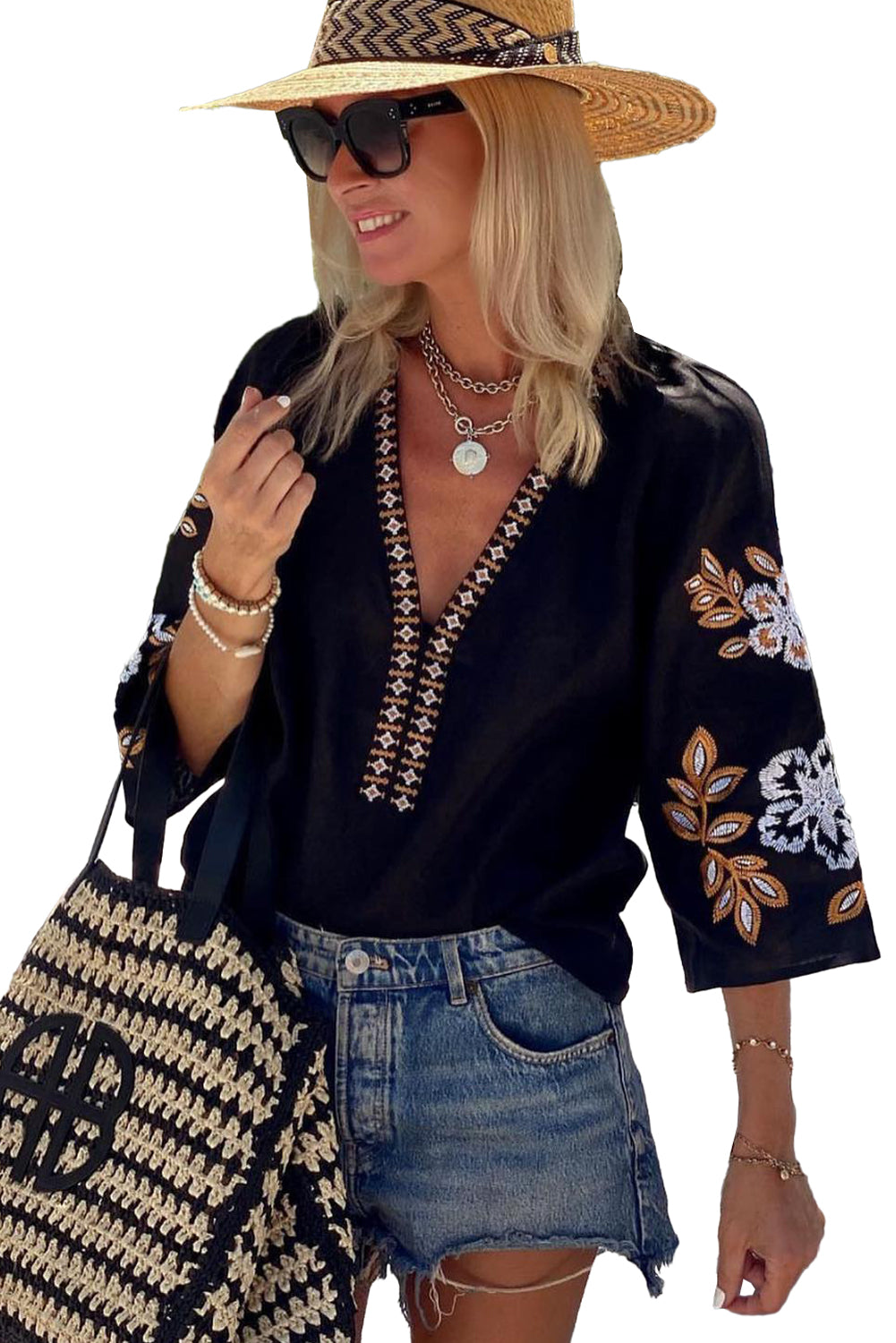 Blusa bohemia con cuello en V y manga bordada floral negra